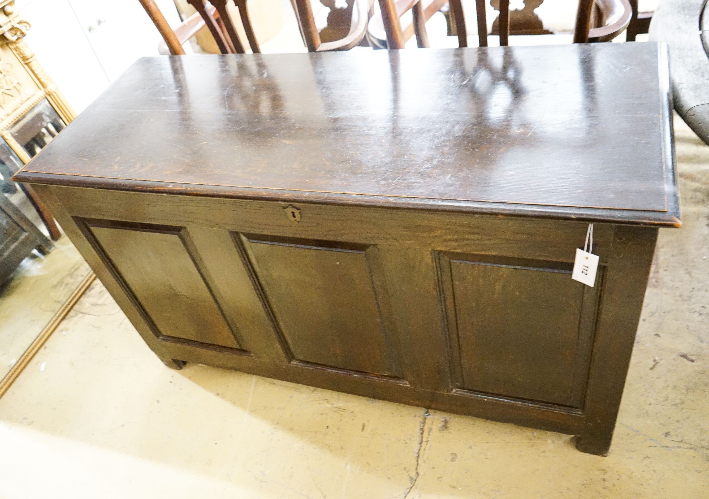 A mid 18th century style oak coffer, with a later hinged top, length 130cm, depth 51cm, height 76cm